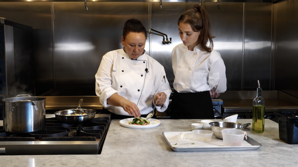 CASA Culinary School Student learning cooking techniques