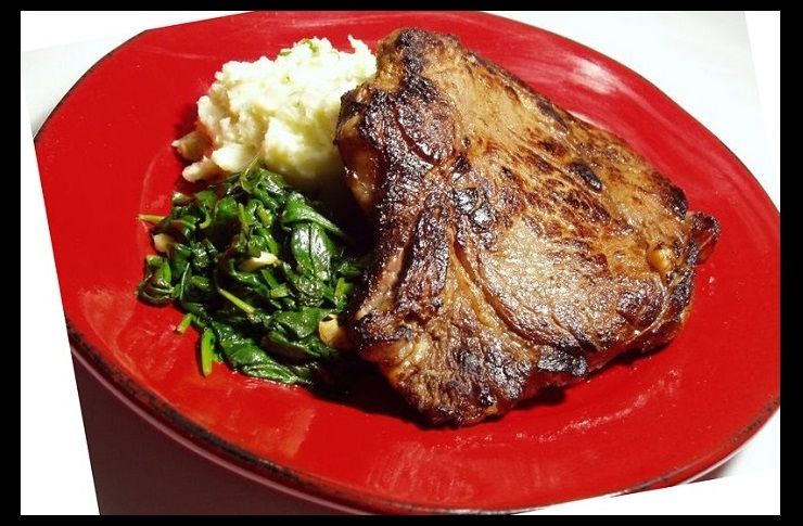 ribeye with mashed potatoes and greens